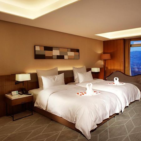 Chongqing The Lotus Hotel Екстериор снимка